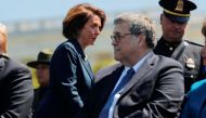 Speaker of the House Nancy Pelosi walks behind Attorney General William Barr as they both attend the 38th Annual National Peace Officers Memorial Service on Capitol Hill, May 15, 2019. Reuters/Carlos Barria