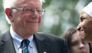 US Senator Bernie Sanders (L), Independent of Vermont, and Representative Ilhan Omar (R), Democrat of Minnesota, hold a press conference to introduce college affordability legislation outside the US Capitol in Washington, DC, June 24, 2019. AFP / SAUL LOE