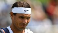 Spain's Rafael Nadal reacts as he arrives for his men's singles match against Croatia's Marin Cilic at The Aspall Tennis Classic tournament at the Hurlingham Club in London on June 26, 2019. / AFP / Daniel LEAL-OLIVAS