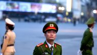 Vietnamese policemen guard the area near the Sofitel Legend Metropole hotel in Hanoi on February 27 2019 ahead of the second US-North Korea summit (AFP/Ye Aung Thu) 