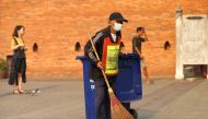 A man sweeps the ground near a palace in Chiang Mai, Thailand, April 3, 2019. Reuters / Soe Zeya Tun