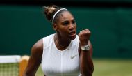 US player Serena Williams celebrates winning a point against US player Alison Riske during their women's singles quarter-final match on day eight of the 2019 Wimbledon Championships at The All England Lawn Tennis Club in Wimbledon, southwest London, on Ju