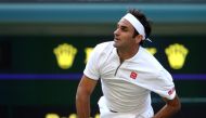 Switzerland’s Roger Federer in action during his Wimbledon men’s singles semi-final match against Spain’s Rafael Nadal at the All England Lawn Tennis and Croquet Club in London, Britain, yesterday. 