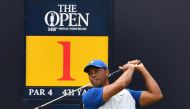 US golfer Tiger Woods prepares to tee off from the first hole during the first round of the British Open golf Championships at Royal Portrush golf club in Northern Ireland on July 18, 2019. AFP / Paul Ellis 