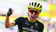 Great Britain's Simon Yates celebrates as he wins on the finish line of the twelfth stage of the 106th edition of the Tour de France cycling race between Toulouse and Bagneres-de-Bigorre, in Bagneres-de-Bigorre on July 18, 2019. AFP / Anne-Christine Poujo