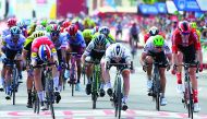 Team Deceuninck rider Netherlands' Fabio Jakobsen (L), Team Bora rider Ireland's Sam Bennett (C) and Team Sunweb rider Germany's Max Walscheid (R) cross the finish of the fourth stage of the 2019 La Vuelta cycling tour of Spain, a 175,5 km route from Cull