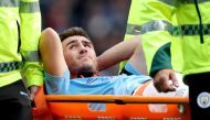 Manchester City's Aymeric Laporte is stretchered off after sustaining an injury REUTERS/Jon Super