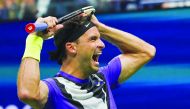 Grigor Dimitrov of Bulgaria reacts to his win against Roger Federer of Switzerland in their Men's Singles Quarter-finals tennis match during the 2019 US Open at the USTA Billie Jean King National Tennis Center in New York on September 3, 2019. AFP / Domin