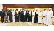 The visiting President of the Republic of Angola, Joao Manuel Lourenco, with Qatari businessmen and other officials posing for a group picture, yesterday.