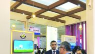 Visitors making enquiries at the Ministry of Commerce and Industry pavilion at the China International Fair for Investment and Trade.