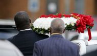 A scene of wreath walks at the Greenville Avenue Church of Christ for the funeral service for Botham Shem Jean on September 13, 2018 in Richardson, Texas. Stewart F House / Getty Images / AFP
