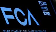 A screen displays the ticker information for Fiat Chrysler Automobiles NV at the post where it's traded on the floor of the New York Stock Exchange, January 12, 2016. Reuters/Brendan McDermid