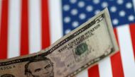FILE PHOTO:  A US five dollar note is seen in this illustration photo, June 1, 2017. Reuters / Thomas White