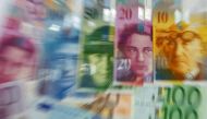 Various Euro banknotes lay next to various Swiss Franc notes in this picture illustration at a bank in Warsaw, July 18, 2011. Reuters/Kacper Pempel