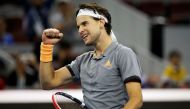 Dominic Thiem of Austria celebrates winning the match against Karen Khachanov of Russia. REUTERS/Jason Lee