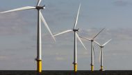 Windmills turn in the breeze at Horns Rev 2, the world largest wind farm 30 km off the west coast of Denmark near Esbjerg, September 15, 2009. Reuters / Bob Strong 
 
