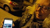 Spanish retiree Joanna Perez Osuna uses her mobile phone to play Pokemon Go on a daily basis in her hometown of Badalona in northern Spain. Handout by Badalona Care Services