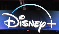 (FILES) In this file photo taken on August 23, 2019, a Disney+ streaming service sign is pictured at the D23 Expo, billed as the 