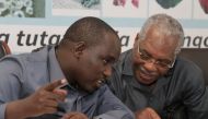 Tanzanian Minister for Minerals Doto Biteko talks to the chairman of the Mining Commission Idris Kikula during the Annual General Meeting by Federation of Miners Association of Tanzania (FEMATA) in Tanga region, Tanzania August 31, 2019. Reuters/Emmanuel 