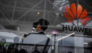 People visit the stand of Chinese telecom giant Huawei during the Web Summit in Lisbon on November 6, 2019. AFP / PATRICIA DE MELO MOREIRA