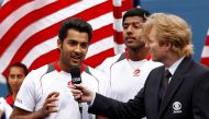 FILE PHOTO: Aisam-Ul-Haq Qureshi (L) of Pakistan and Rohan Bopanna of India are interviewed after their doubles match against Bob and Mike Bryan of the U.S. at the U.S. Open tennis tournament in New York, September 10, 2010. REUTERS/Kevin Lamarque/File Ph