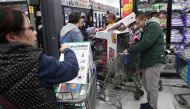 People wait in line pay at a Walmart during a sales event on Thanksgiving day in Westbury, New York, US, November 22, 2018. Reuters / Shannon Stapleton