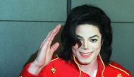 In this file photo taken on March 19, 1996 US pop star Michael Jackson waves to photographers during a press conference in Paris. AFP / Vincent Amalvy