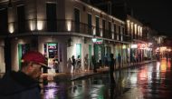 File photo: Visitors check out the attractions along Bourbon Street in the French Quarter despite rainfall from Hurricane Barry on July 12, 2019 in New Orleans. Scott Olson / Getty Images / AFP