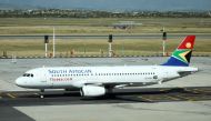 A South African Airways (SAA) aircraft is pictured after landing at Cape Town International Airport in Cape Town, South Africa December 9, 2019. Reuters/Sumaya Hisham
 
