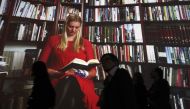 Visitors check out the Iceland pavilion featuring giant projections of people reading, on October 12, 2011 at the Frankfurt Book Fair, where Iceland was the guest of honour in 2011. AFP / Daniel Roland
