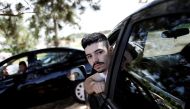 Uber drivers sit in their cars as they wait for passengers in Sao Paulo, Brazil, February 13, 2017. Reuters/Nacho Doce