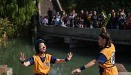 This photo taken on October 29, 2019, shows artists performing during the 7th annual Wuzhen Theatre Festival in Wuzhen in Zhejiang province, two hours from Shanghai. AFP / Hector Retamal 