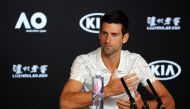 Serbia's Novak Djokovic speaks during a press conference ahead of the Australian Open tennis tournament in Melbourne on January 19, 2020. AFP / DAVID GRAY 