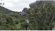 Smoke billowing from a fire at Kapi'Olani park where an ongoing shooting incident occurred in Honolulu, Hawaii in this still image obtained from a January 19, 2020 social media video. Twitter @HelloHiMattHere via REUTERS 