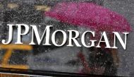 In this file photo taken on May 15, 2012 people walk past the JP Morgan Chase Building on Park Avenue in New York. AFP / Timothy A Clary
 