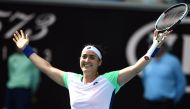 Tunisia's Ons Jabeur celebrates after a victory against China's Wang Qiang during their women's singles match on day seven of the Australian Open tennis tournament in Melbourne on January 26, 2020. /AFP / Greg Wood /