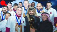 The President of Qatar Olympic Committee H E Sheikh Joaan bin Hamad Al Thani and Qatar Handball Association President Ahmed Mohammed Al Shaabi and coach Valero Rivera Lopez pose for a picture with the victorious Qatar team, winners of the 19th Asian Handb