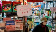 A sign announces that masks are sold out at a grocery store following the outbreak of a new coronavirus, in Hong Kong, China February 2, 2020. Reuters/Tyrone Siu