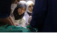 Dr Amani Ballour treats a patient in a scene from the film ‘The Cave’ 