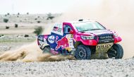 Qatar's Nasser Saleh Al Attiyah and French navigator Matthieu Baumel driving their Toyota Hilux during yesterday's stage of the Manateq Qatar Cross-Country Rally.