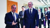 Greek Finance Minister Christos Staikouras (L) welcomes his French counterpart Bruno Le Maire prior to their talks in Athens on February 25, 2020. AFP / Louisa Gouliamaki