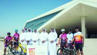 Hassan Al Emadi (centre), General Manager of  Dolphin Energy Qatar is seen along with other officials and staff ahead of the 2020 Ooredoo Ride of Champions. Ali Al Rahbi, Chief Operating Officer - Upstream, Rasheed Al Rasheed, Director Risk and Quality Up