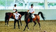 Belgian rider Nicola Philippaerts (centre) offers tips to young riders during the Internations Camp at Al Shaqab, yesterday.