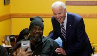 Democratic US presidential candidate and former Vice President Joe Biden greets supporters at Pearls Southern Cooking in Jackson, Mississippi, March 8, 2020. Reuters/Brendan McDermid
 