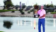 Jorge Campillo, winner of the Commercial Bank Qatar Masters, poses for a picture with The Mother of Pearl Trophy during the victory ceremony at the Education City Golf Club yesterday.