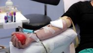 File photo: A volunteer donates blood during the international blood donation day in Nice, France, June 14, 2018. REUTERS/Eric Gaillard/File Photo