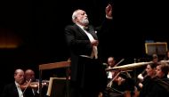 FILE PHOTO: Polish composer Krzysztof Penderecki conducts the Israel Philharmonic Orchestra during a performance of his Polish Requiem in Tel Aviv February 12, 2014. REUTERS/Finbarr O'Reilly/File Photo