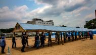 UNHCR workers setting up a temporary hospital to care for those infected with the COVID-19, in Cucuta, Colombia, on the border with Venezuela, on March 28, 2020. AFP / Schneyder Mendoza 
 