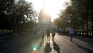 People take advantage of minimal traffic as they run, walk, jog and cycle down East Capitol Street towards the U.S. Capitol building as the spread of coronavirus disease (COVID-19) continues in Washington, U.S., April 6, 2020. REUTERS/Leah Millis
