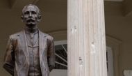 Bullet impacts are seen on a column in front of the Cuban embassy in Washington, DC, on April 30, 2020, after a man fired at the building. A man was arrested early Thursday after opening fire on the Cuban embassy, the US Secret Service said. The unidentif